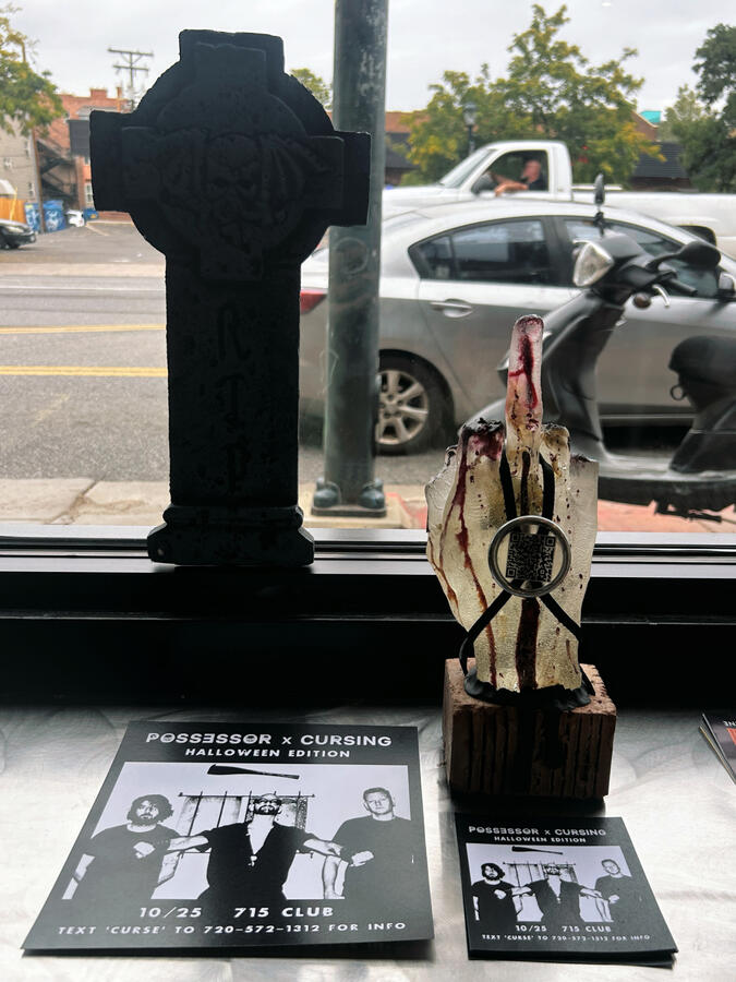 Placed at an unnamed friendly Colfax show window.